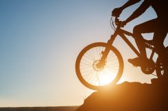 Silhouette of a man on mountain-bike during sunset. Silhouette of a man on mountain-bike during sunset.
